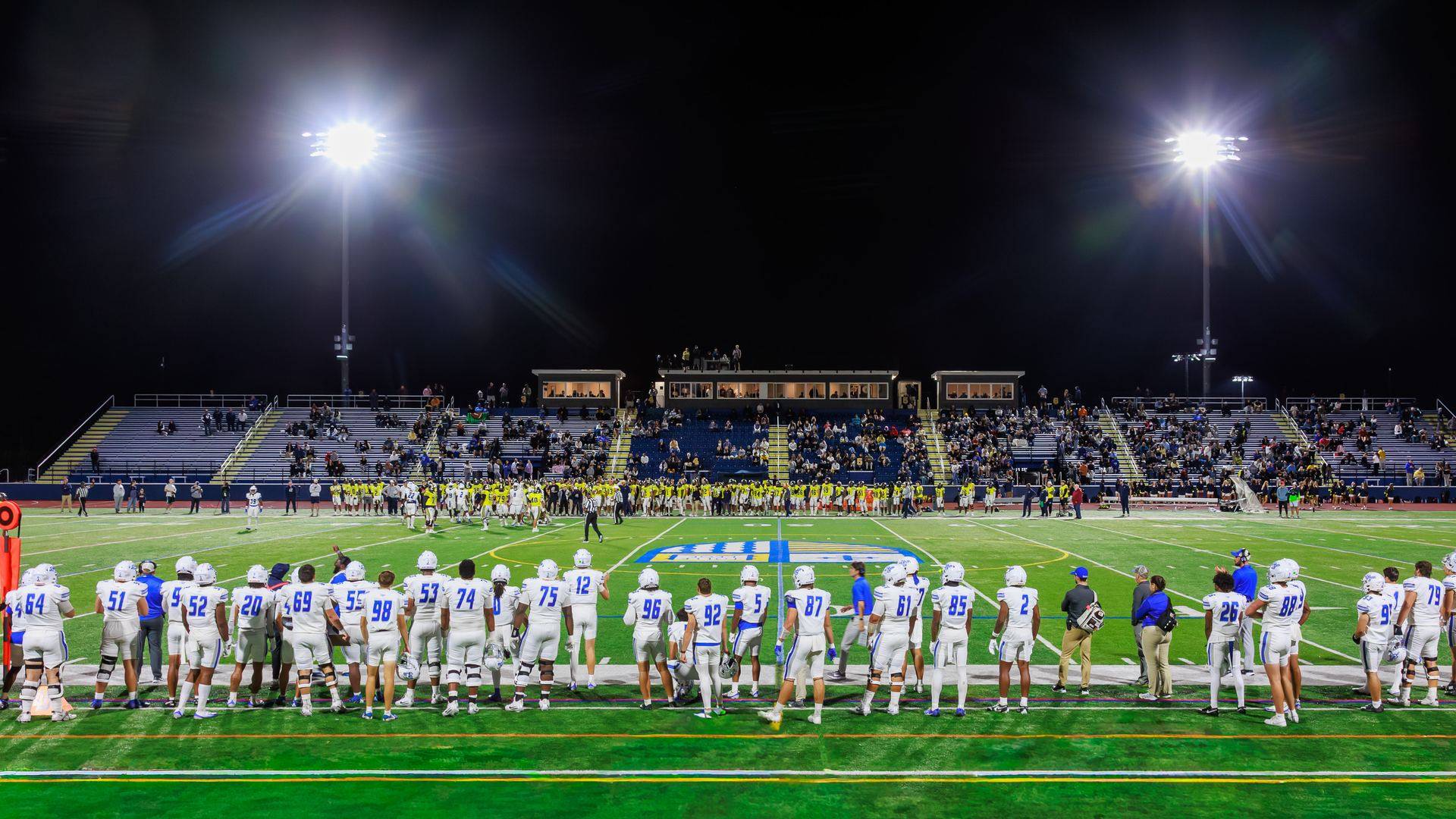 The stadium at night under floodlights